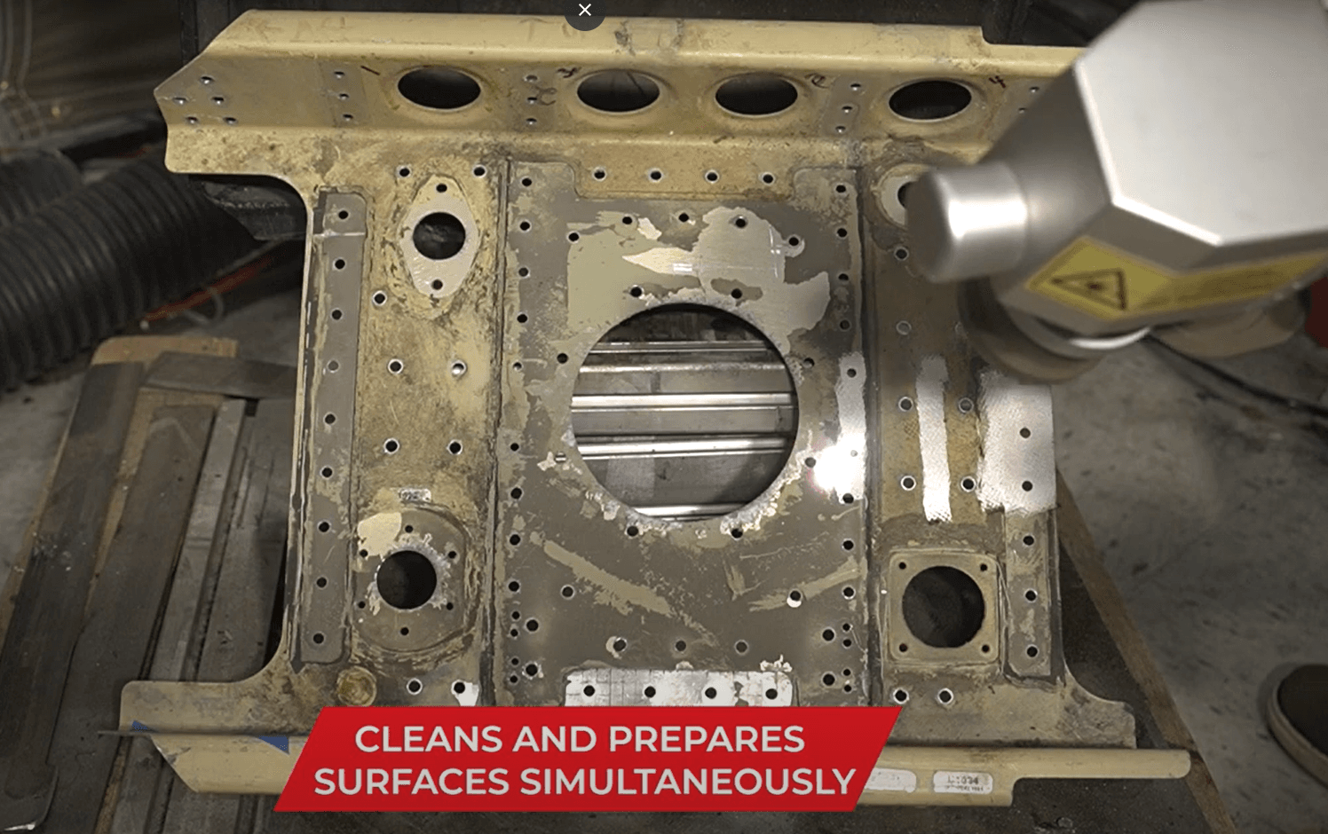 FP-300 laser cleaning and preparing an aircraft panel simultaneously